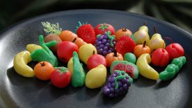 Fruits made of marzipan hiding the sinister taste by appearing to be appetizing.